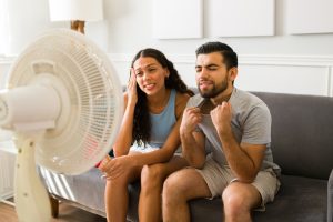 Couple Sweating and Feeling Bad Due to Broken AC